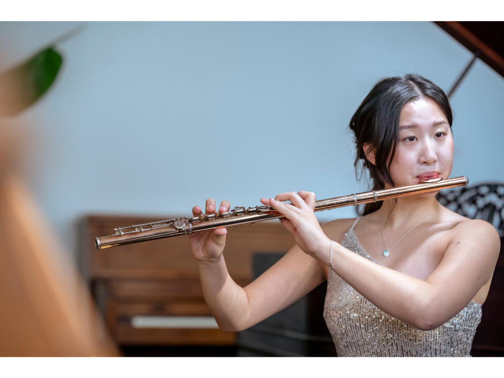 why is a flute considered a woodwind instrument?
